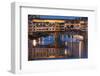 Italy, Tuscany, Florence, Ponte Vecchio reflected in Arno River at dusk.-Merrill Images-Framed Photographic Print