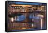 Italy, Tuscany, Florence, Ponte Vecchio reflected in Arno River at dusk.-Merrill Images-Framed Stretched Canvas