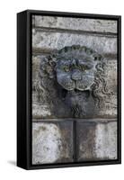 Italy, Tuscany, Montepulciano. Carving of a lions head on a stone building.-Julie Eggers-Framed Stretched Canvas