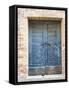 Italy, Tuscany. Old blue door with iron latch in a village in Tuscany.-Julie Eggers-Framed Stretched Canvas