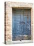 Italy, Tuscany. Old blue door with iron latch in a village in Tuscany.-Julie Eggers-Stretched Canvas