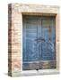 Italy, Tuscany. Old blue door with iron latch in a village in Tuscany.-Julie Eggers-Stretched Canvas