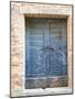 Italy, Tuscany. Old blue door with iron latch in a village in Tuscany.-Julie Eggers-Mounted Photographic Print