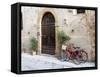Italy, Tuscany, Pienza. Bicycles Parked Along the Streets of Pienza-Julie Eggers-Framed Stretched Canvas