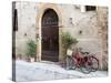 Italy, Tuscany, Pienza. Bicycles Parked Along the Streets of Pienza-Julie Eggers-Stretched Canvas