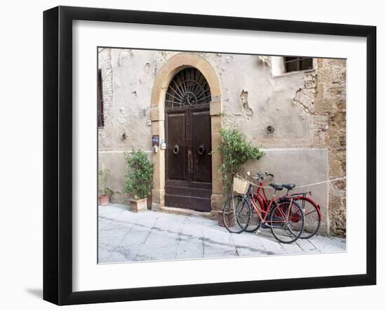 Italy, Tuscany, Pienza. Bicycles Parked Along the Streets of Pienza-Julie Eggers-Framed Premium Photographic Print