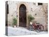 Italy, Tuscany, Pienza. Bicycles Parked Along the Streets of Pienza-Julie Eggers-Stretched Canvas