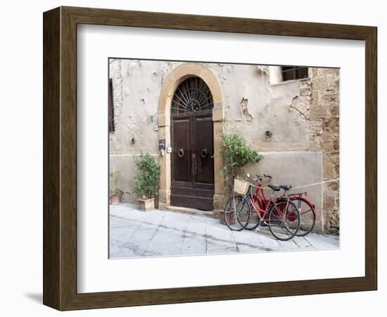 Italy, Tuscany, Pienza. Bicycles Parked Along the Streets of Pienza-Julie Eggers-Framed Photographic Print