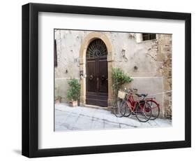 Italy, Tuscany, Pienza. Bicycles Parked Along the Streets of Pienza-Julie Eggers-Framed Photographic Print