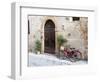 Italy, Tuscany, Pienza. Bicycles Parked Along the Streets of Pienza-Julie Eggers-Framed Photographic Print