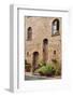 Italy, Tuscany, Pienza. Flower pots and potted plants decorate a narrow street in a Tuscany-Julie Eggers-Framed Photographic Print