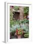 Italy, Tuscany, Pienza. Potted plants in the corner of a street in the town of Pienza.-Julie Eggers-Framed Photographic Print