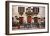 Italy, Tuscany, Pienza. Tables and chairs set up outside for outdoor dining in the town of Pienza.-Julie Eggers-Framed Photographic Print