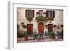 Italy, Tuscany, Pienza. Tables and chairs set up outside for outdoor dining in the town of Pienza.-Julie Eggers-Framed Photographic Print