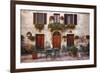 Italy, Tuscany, Pienza. Tables and chairs set up outside for outdoor dining in the town of Pienza.-Julie Eggers-Framed Photographic Print