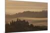 Italy, Tuscany, San Gimignano, farmhouses on ridges with fog at dawn.-Merrill Images-Mounted Photographic Print