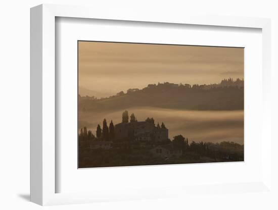 Italy, Tuscany, San Gimignano, farmhouses on ridges with fog at dawn.-Merrill Images-Framed Photographic Print