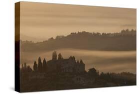 Italy, Tuscany, San Gimignano, farmhouses on ridges with fog at dawn.-Merrill Images-Stretched Canvas