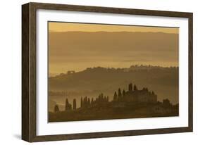 Italy, Tuscany, San Gimignano, farmhouses on ridges with fog at dawn.-Merrill Images-Framed Photographic Print