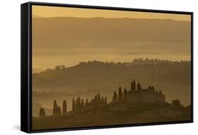 Italy, Tuscany, San Gimignano, farmhouses on ridges with fog at dawn.-Merrill Images-Framed Stretched Canvas