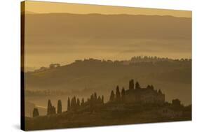 Italy, Tuscany, San Gimignano, farmhouses on ridges with fog at dawn.-Merrill Images-Stretched Canvas