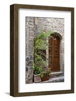 Italy, Tuscany, San Gimignano. Homes decorated with flower pots along the streets of San Gimignano.-Julie Eggers-Framed Photographic Print