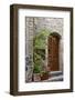 Italy, Tuscany, San Gimignano. Homes decorated with flower pots along the streets of San Gimignano.-Julie Eggers-Framed Photographic Print