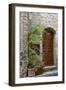 Italy, Tuscany, San Gimignano. Homes decorated with flower pots along the streets of San Gimignano.-Julie Eggers-Framed Photographic Print