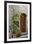 Italy, Tuscany, San Gimignano. Homes decorated with flower pots along the streets of San Gimignano.-Julie Eggers-Framed Photographic Print