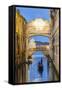 Italy, Veneto, Venice. Bridge of Sighs Illuminated at Dusk with Gondolas-Matteo Colombo-Framed Stretched Canvas