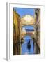 Italy, Veneto, Venice. Bridge of Sighs Illuminated at Dusk with Gondolas-Matteo Colombo-Framed Photographic Print
