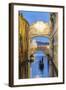 Italy, Veneto, Venice. Bridge of Sighs Illuminated at Dusk with Gondolas-Matteo Colombo-Framed Photographic Print