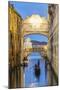 Italy, Veneto, Venice. Bridge of Sighs Illuminated at Dusk with Gondolas-Matteo Colombo-Mounted Photographic Print