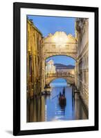 Italy, Veneto, Venice. Bridge of Sighs Illuminated at Dusk with Gondolas-Matteo Colombo-Framed Photographic Print