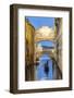 Italy, Veneto, Venice. Bridge of Sighs Illuminated at Dusk with Gondolas-Matteo Colombo-Framed Photographic Print