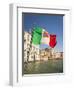 Italy, Venice, Italian flag with Naval ensign flying above Grand Canal.-Merrill Images-Framed Photographic Print