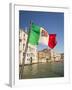 Italy, Venice, Italian flag with Naval ensign flying above Grand Canal.-Merrill Images-Framed Photographic Print