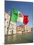 Italy, Venice, Italian flag with Naval ensign flying above Grand Canal.-Merrill Images-Mounted Photographic Print