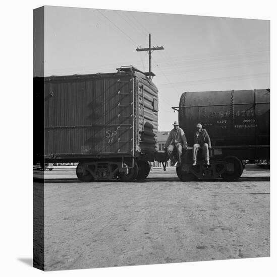 Itinerant men on oil tank cars passing through California, 1938-Dorothea Lange-Stretched Canvas