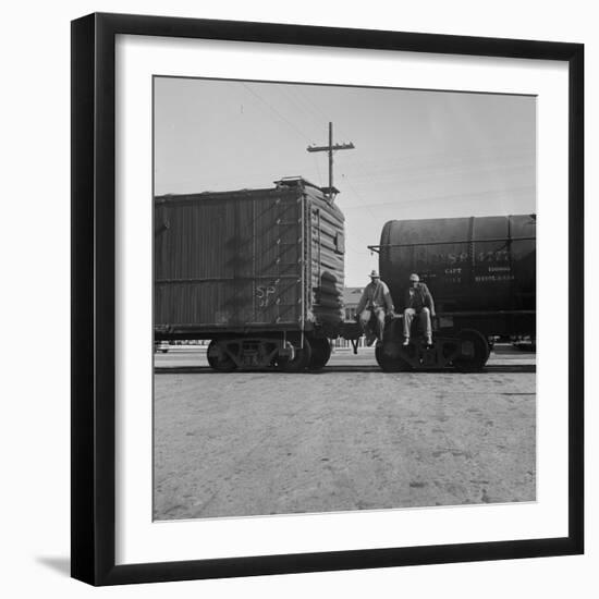 Itinerant men on oil tank cars passing through California, 1938-Dorothea Lange-Framed Photographic Print