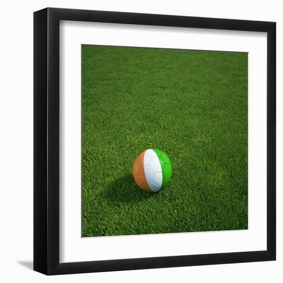 Ivorian Soccerball Lying on Grass-zentilia-Framed Art Print