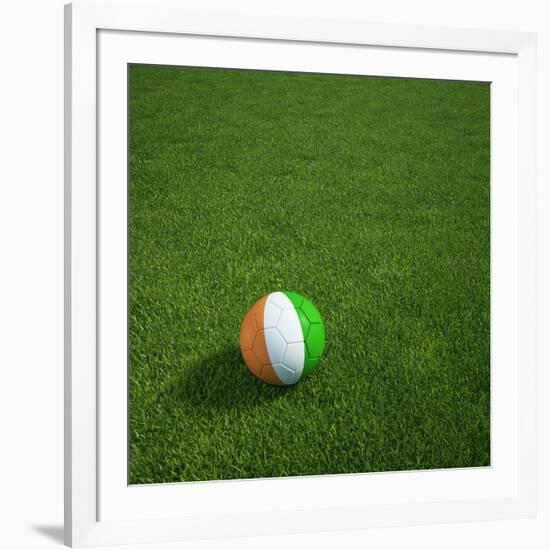 Ivorian Soccerball Lying on Grass-zentilia-Framed Art Print