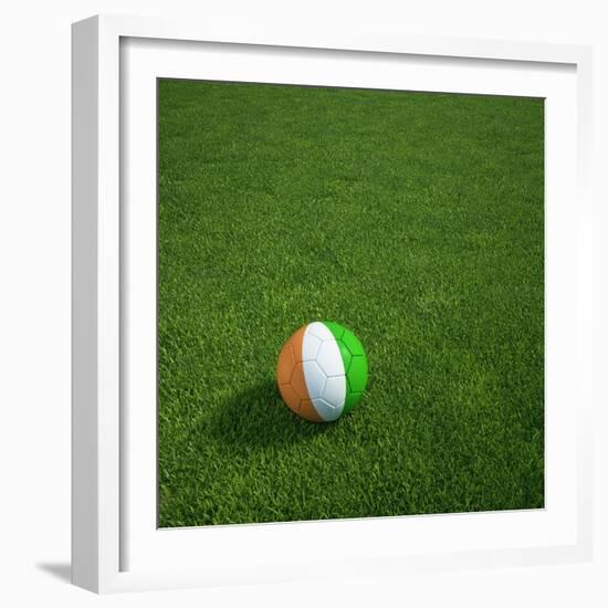 Ivorian Soccerball Lying on Grass-zentilia-Framed Art Print