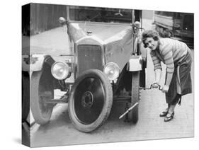 Ivy Cummings Changing a Tyre on a 1925 Singer 10/26, London, C1925-null-Stretched Canvas