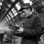 Conductor on the Orient Express Train Making Notes on a Piece of Paper, June 1950-Jack Birns-Photographic Print