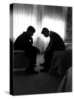 Jack Kennedy Conferring with His Brother and Campaign Organizer Bobby Kennedy in Hotel Suite-Hank Walker-Stretched Canvas