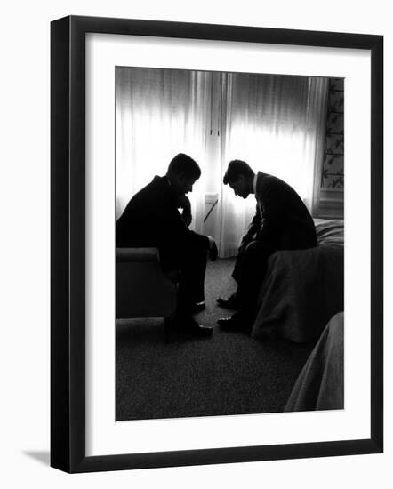 Jack Kennedy Conferring with His Brother and Campaign Organizer Bobby Kennedy in Hotel Suite-Hank Walker-Framed Premium Photographic Print