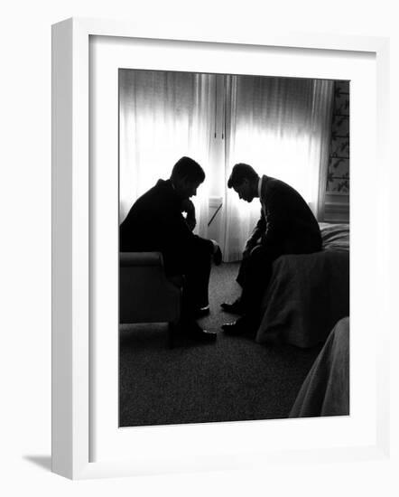 Jack Kennedy Conferring with His Brother and Campaign Organizer Bobby Kennedy in Hotel Suite-Hank Walker-Framed Premium Photographic Print