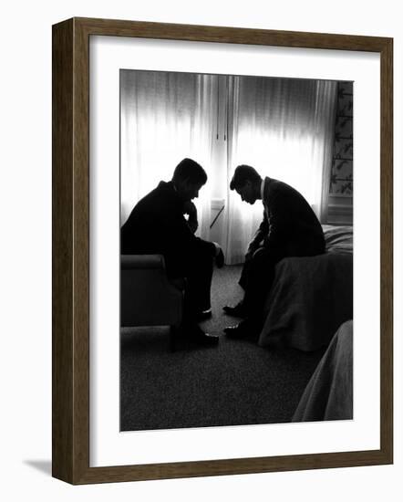 Jack Kennedy Conferring with His Brother and Campaign Organizer Bobby Kennedy in Hotel Suite-Hank Walker-Framed Photographic Print