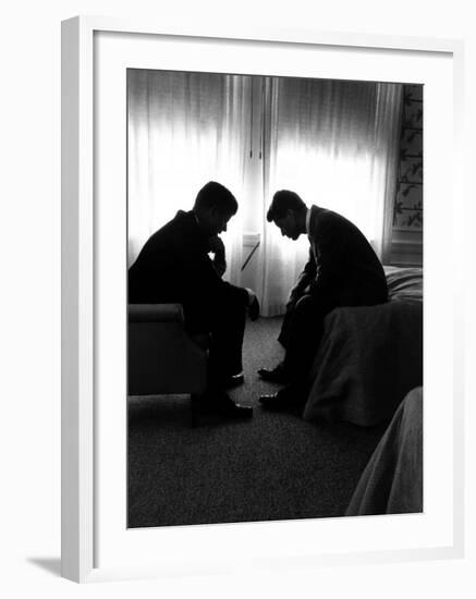 Jack Kennedy Conferring with His Brother and Campaign Organizer Bobby Kennedy in Hotel Suite-Hank Walker-Framed Photographic Print